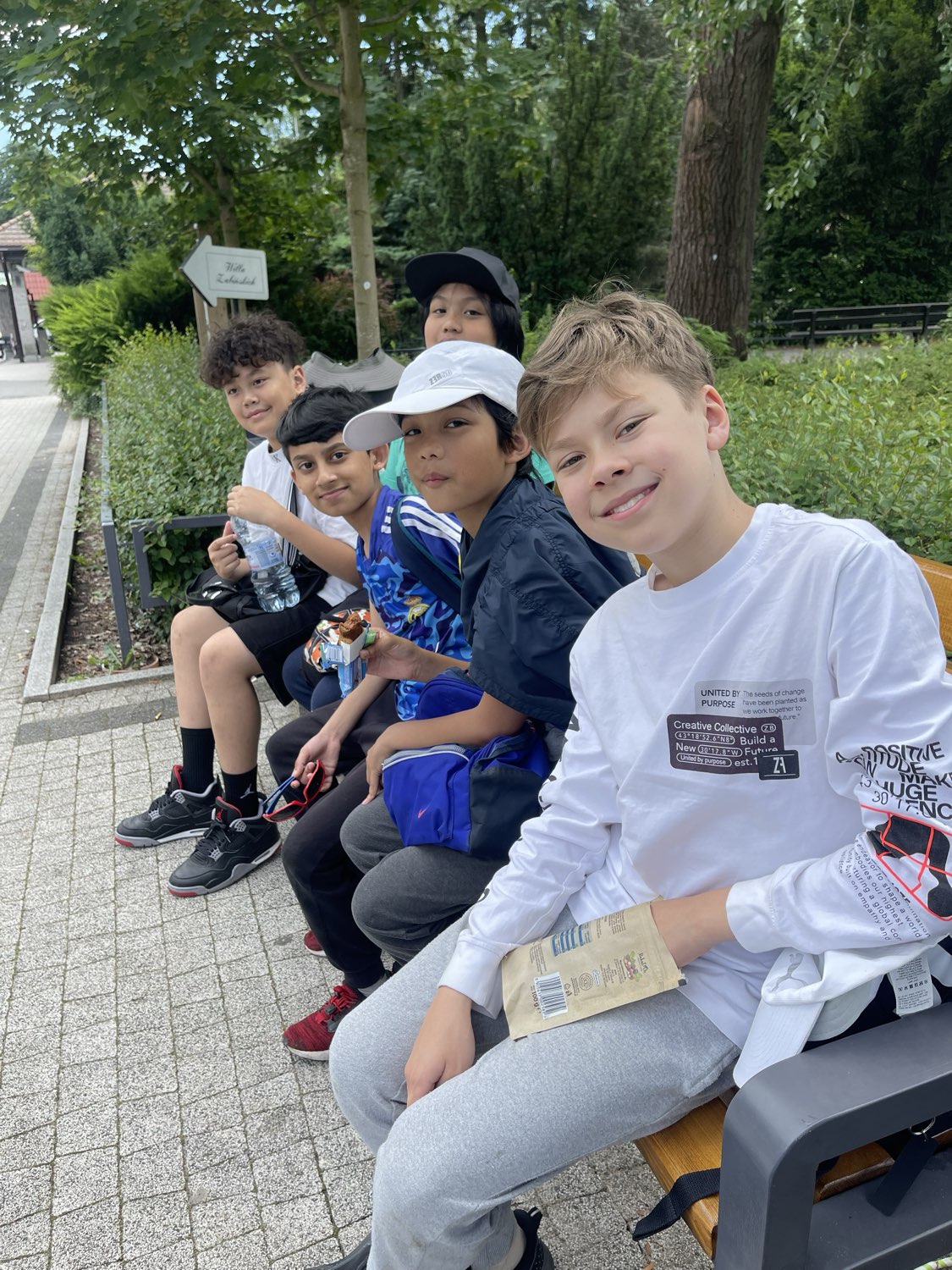 IAS Warsaw students being active outdoors on the forest campus