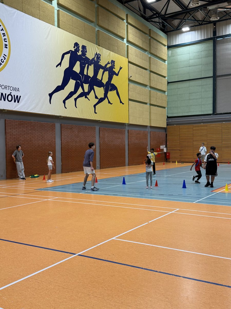 Students taking part in a lesson in the sports hall.