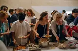 IAS students and families sharing food at a school event